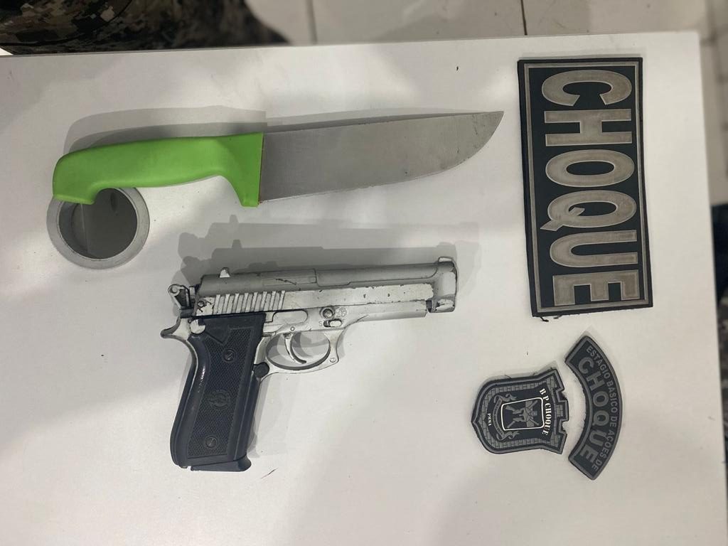 BPCHOQUE CONDUZ HOMEM POR PORTE ILEGAL DE ARMA DE FOGO